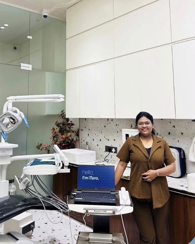 Instagram post from Smile Design Studio — inside our clinic treatment room with iTero digital scanner